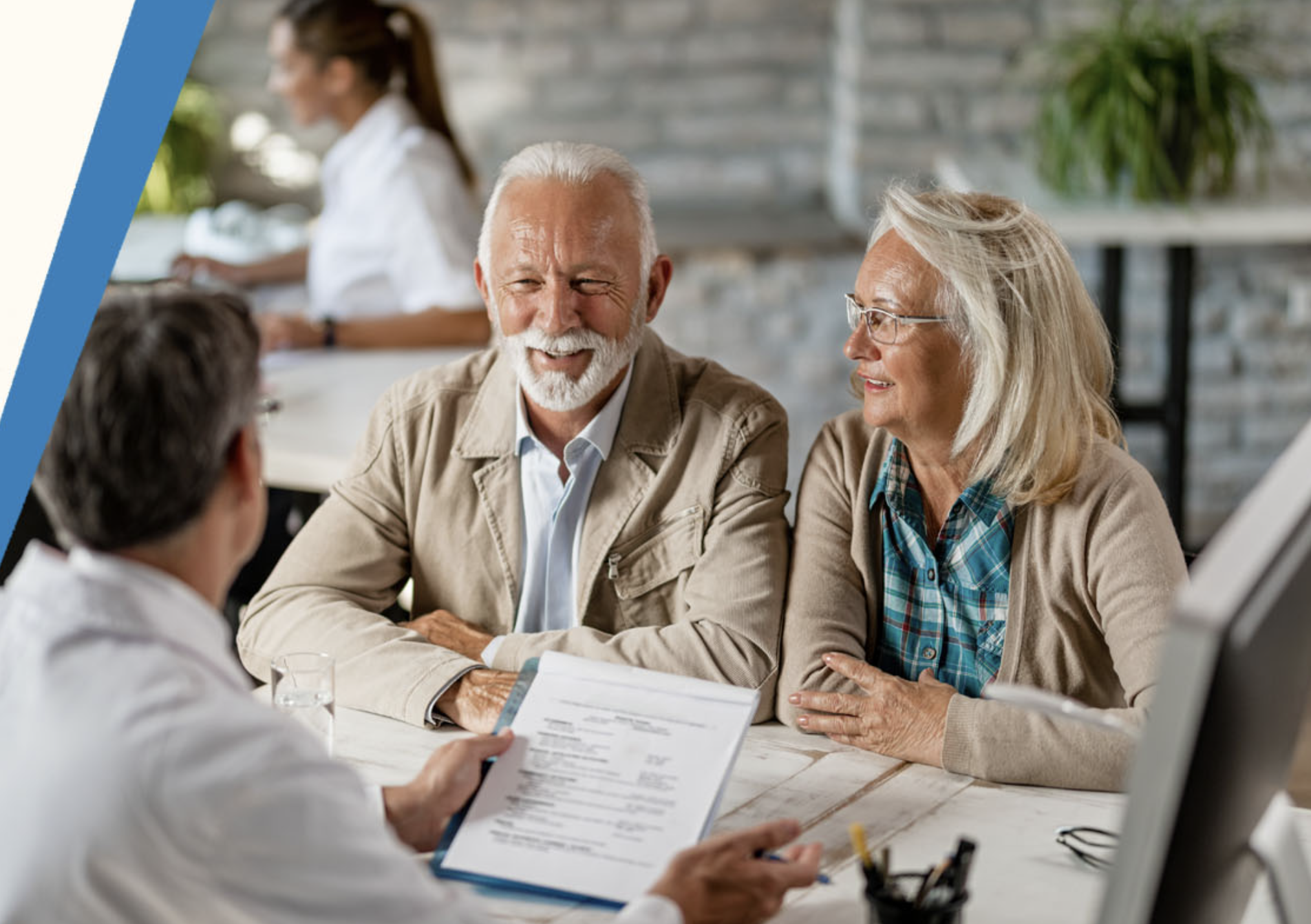 Elderly couple reviewing options